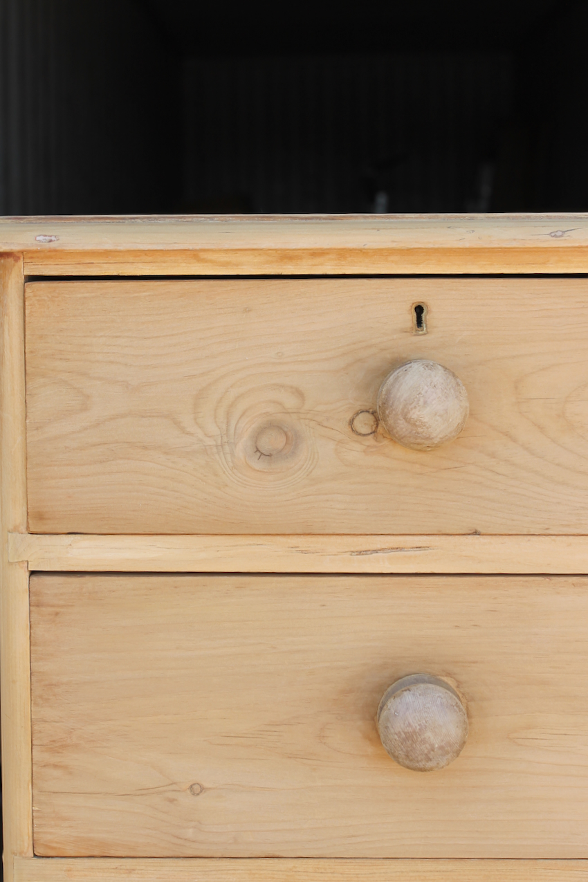 beautiful fine pine honey coloured english chest with five drawers and skirt with pretty detailing & original bun feet, very clean condition.