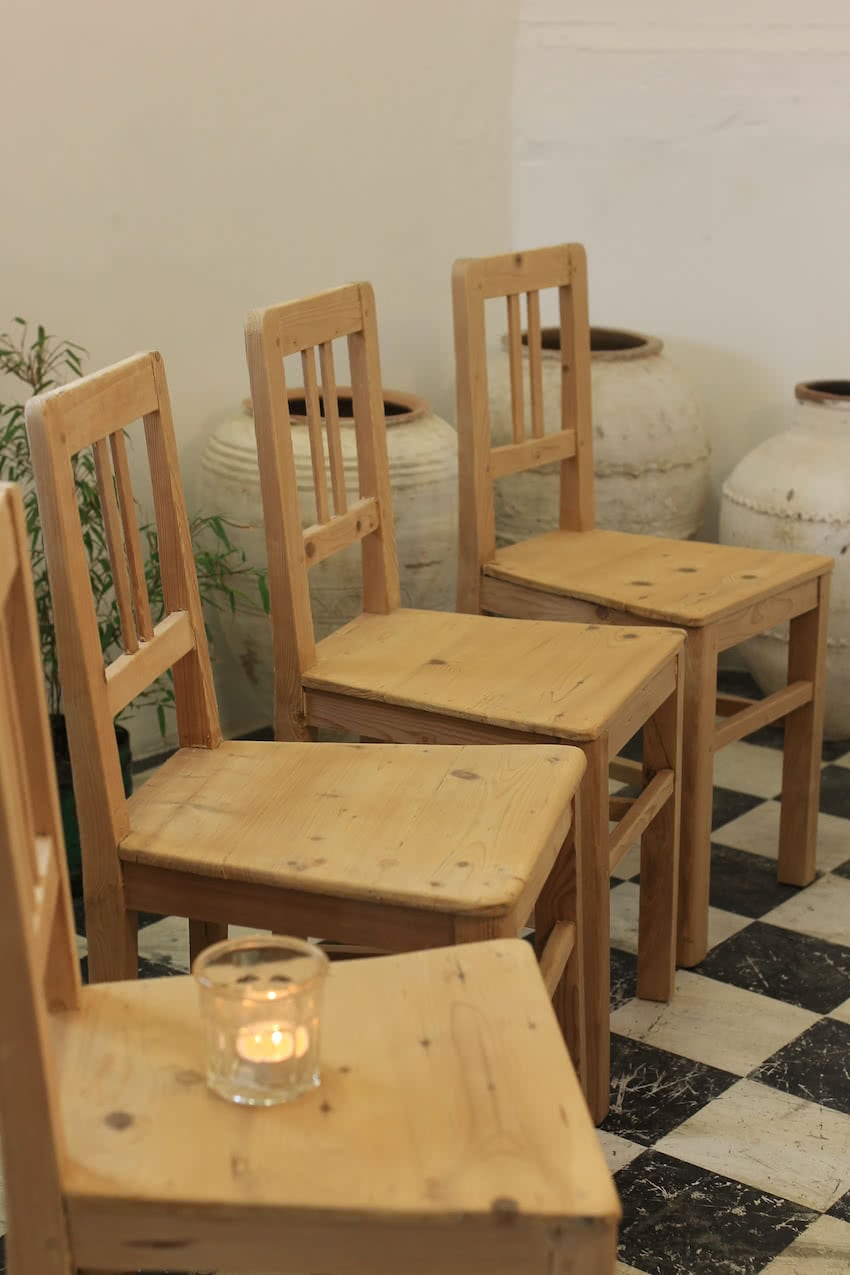 four matching chairs stripped pine chairs from europe, a simple shape with nice shaped seat.