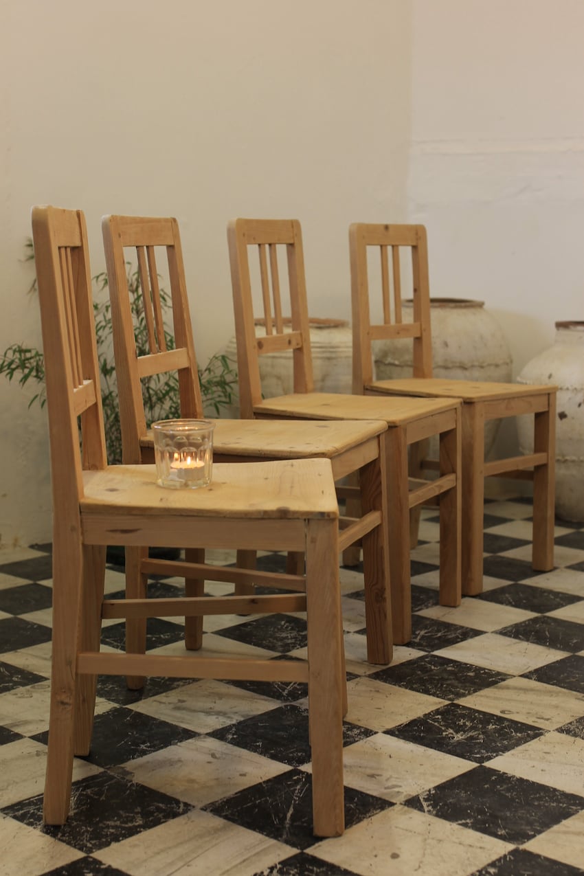 four matching chairs stripped pine chairs from europe, a simple shape with nice shaped seat.