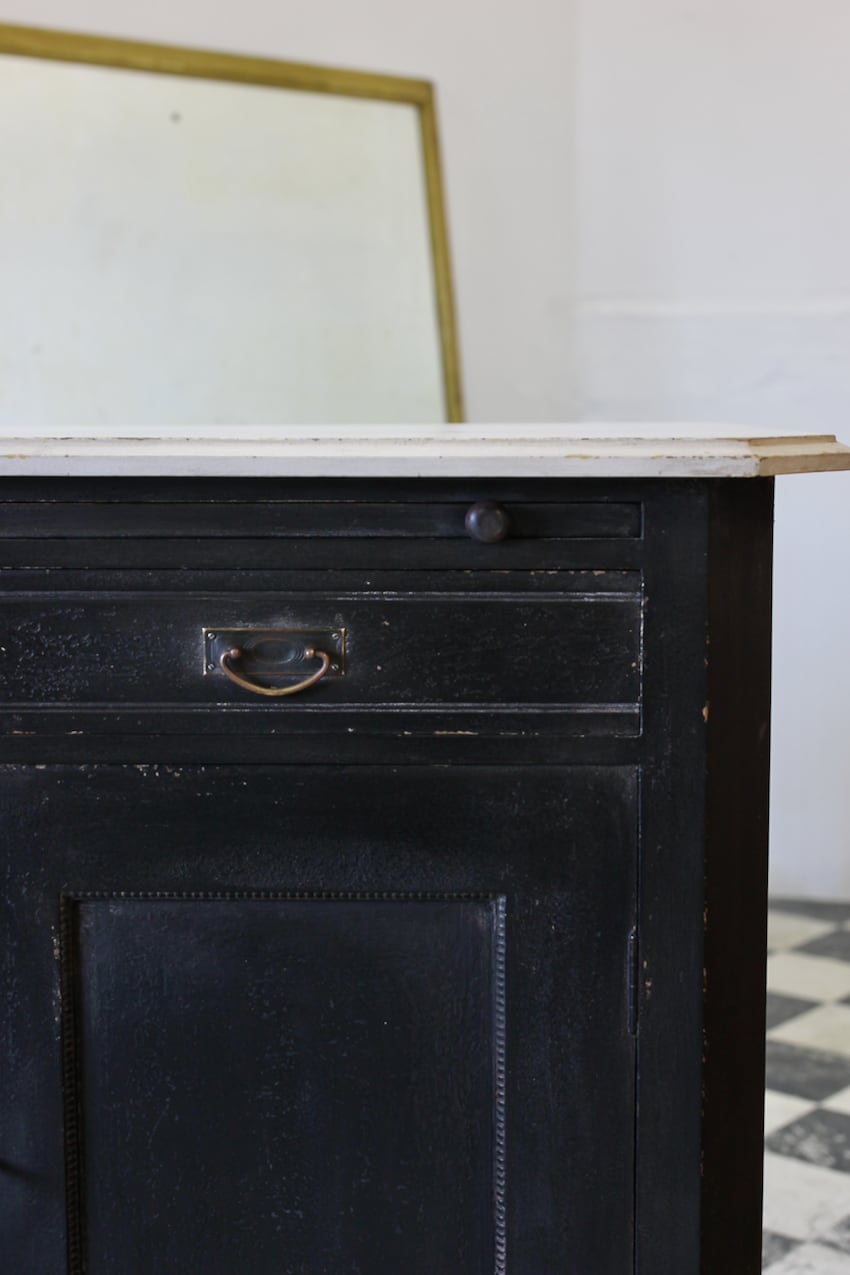 ivory & black large french two drawer cupboard base with two drawers, old brass handles, a long pine shelf inside & a deep plinth.