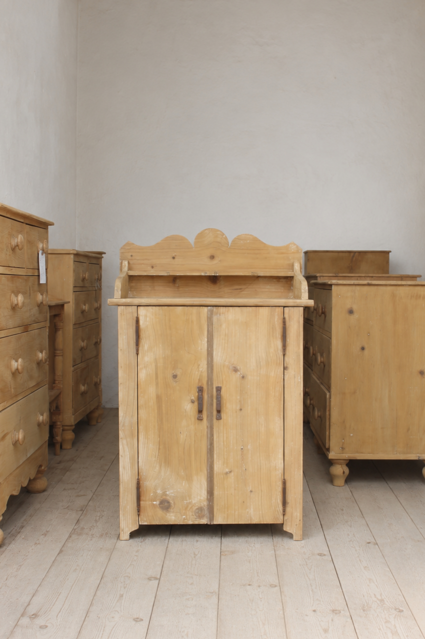 very pretty galleried french all original pine two door cupboardcupboard with shelf & metal handles and typical hinges.