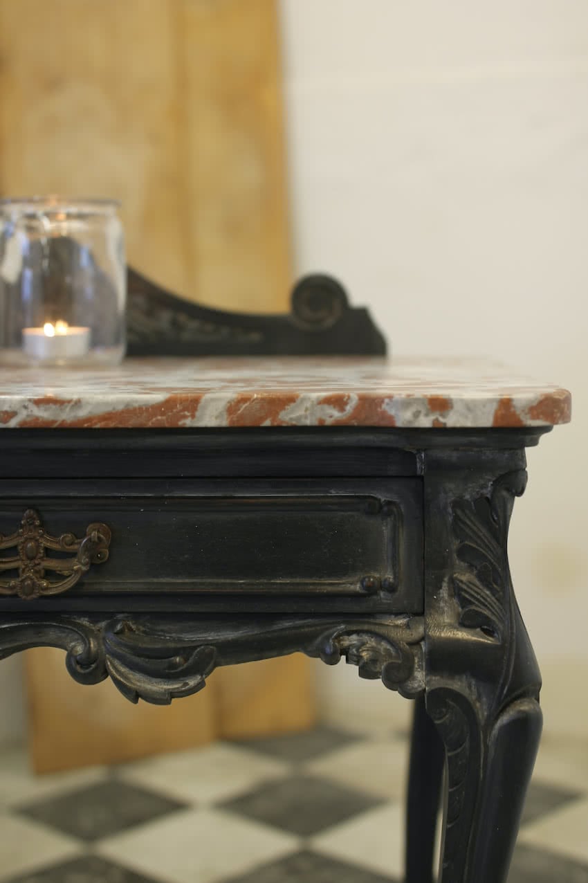 very elegant table with shaped marble top, two drawers with original brass ornate handles & elegant styled & carved legs.