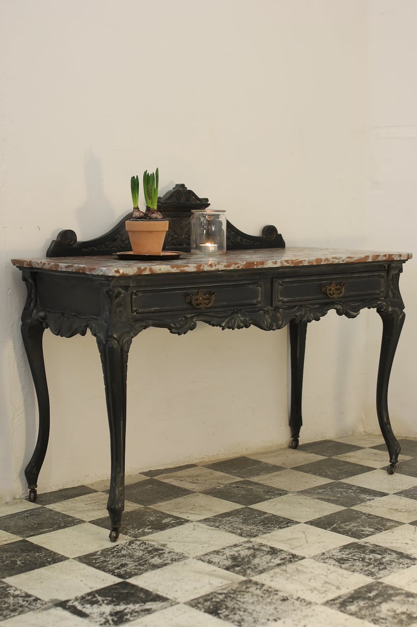 very elegant table with shaped marble top, two drawers with original brass ornate handles & elegant styled & carved legs.