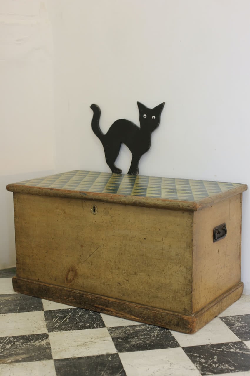 beautiful victorian pine linen chest with original paint & repainted geo pattern on top in lichen and navy & a secret candle box inside.