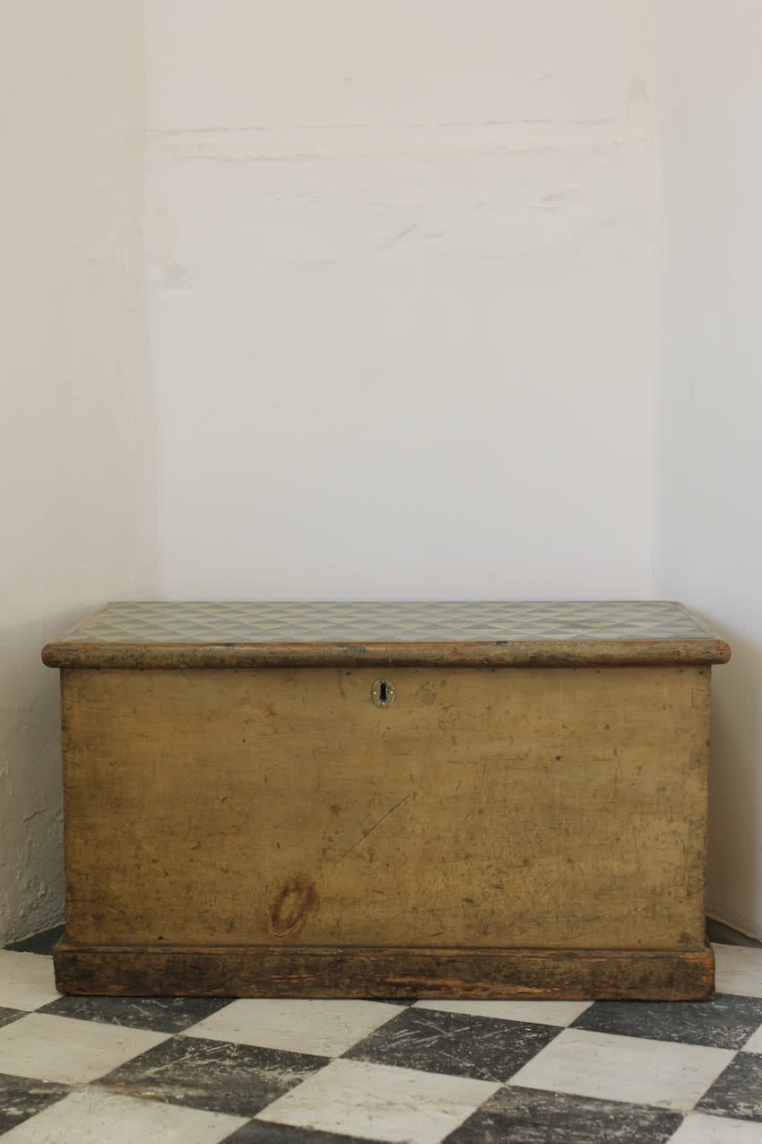 beautiful victorian pine linen chest with original paint & repainted geo pattern on top in lichen and navy & a secret candle box inside.