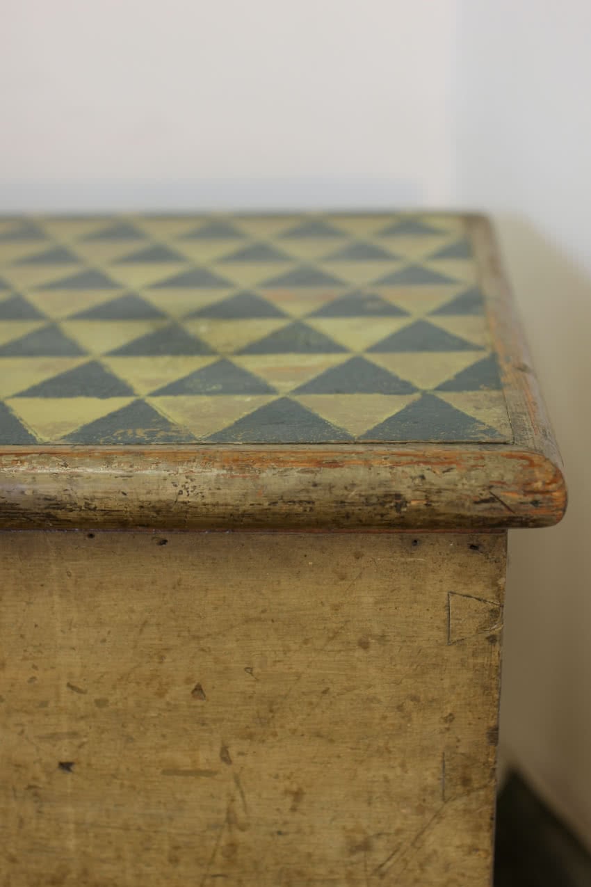 beautiful victorian pine linen chest with original paint & repainted geo pattern on top in lichen and navy & a secret candle box inside.