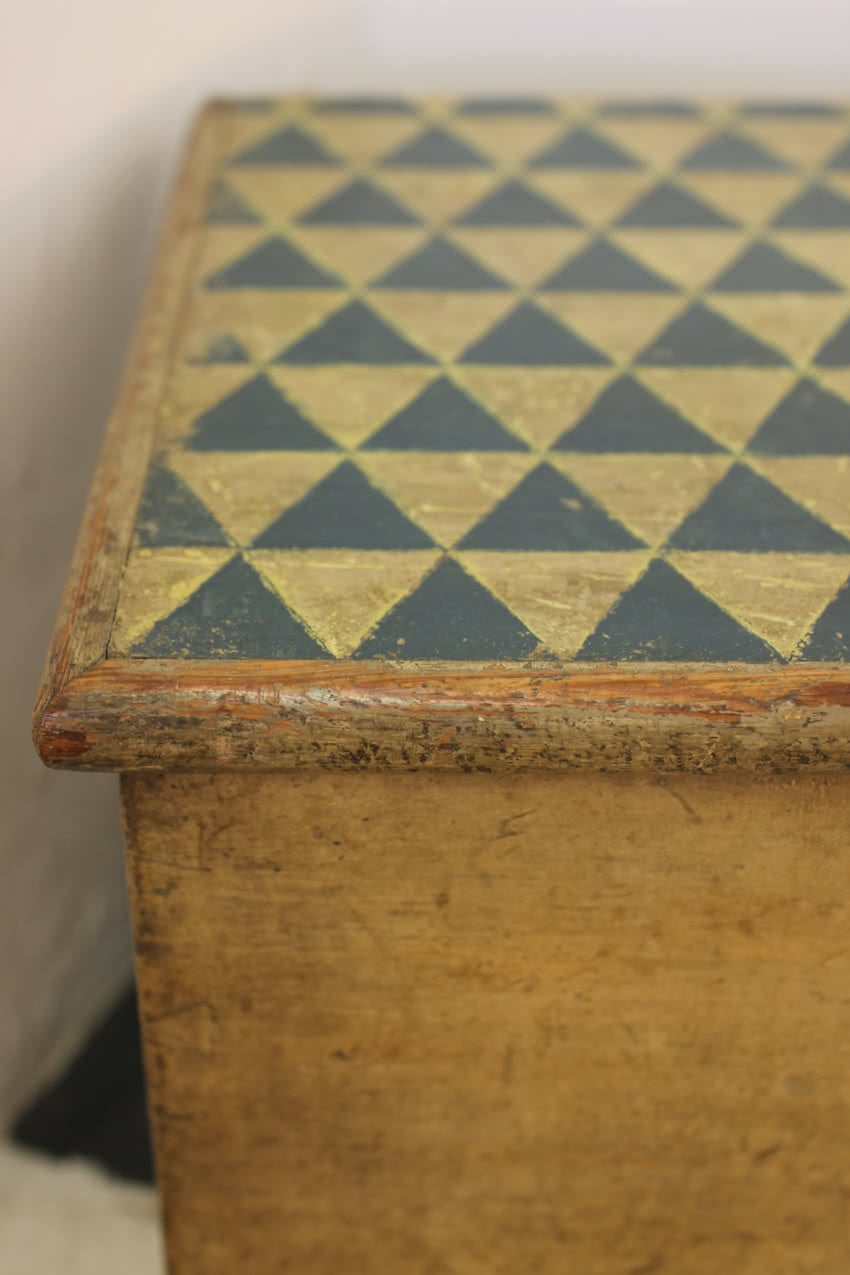 beautiful victorian pine linen chest with original paint & repainted geo pattern on top in lichen and navy & a secret candle box inside.