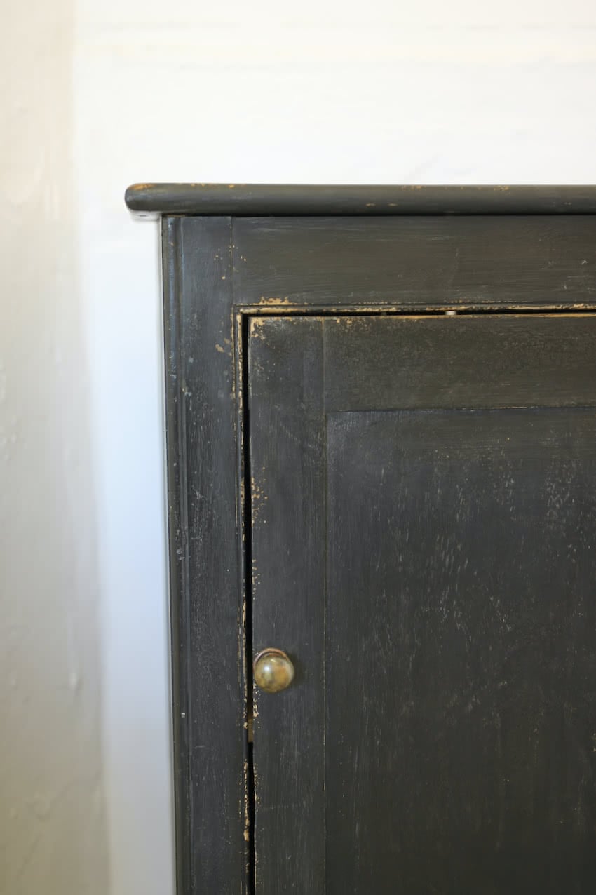 gorgeous restored victorian pine cupboard painted in black with a distressed finish & interior door painted in lichen, the cupboard has original shelf inside. 