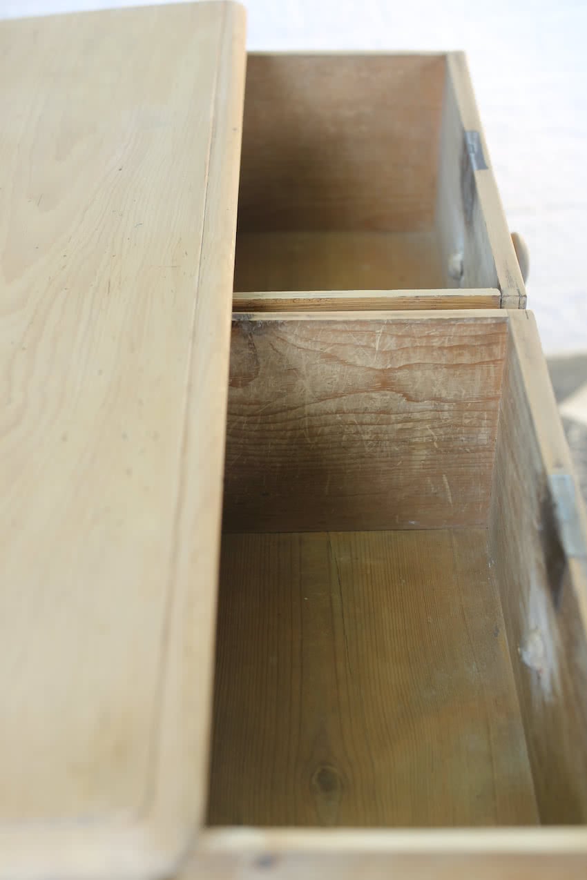 beautiful restored very large pine chest with six graduating drawers, contrasting wooden knobs and new tulip shaped turned feet.