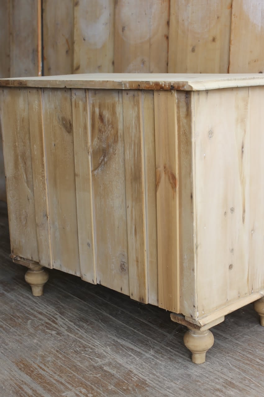 gorgeous very clean english pine cupboard two door base with one long original shelf inside and two brass round knobs.
