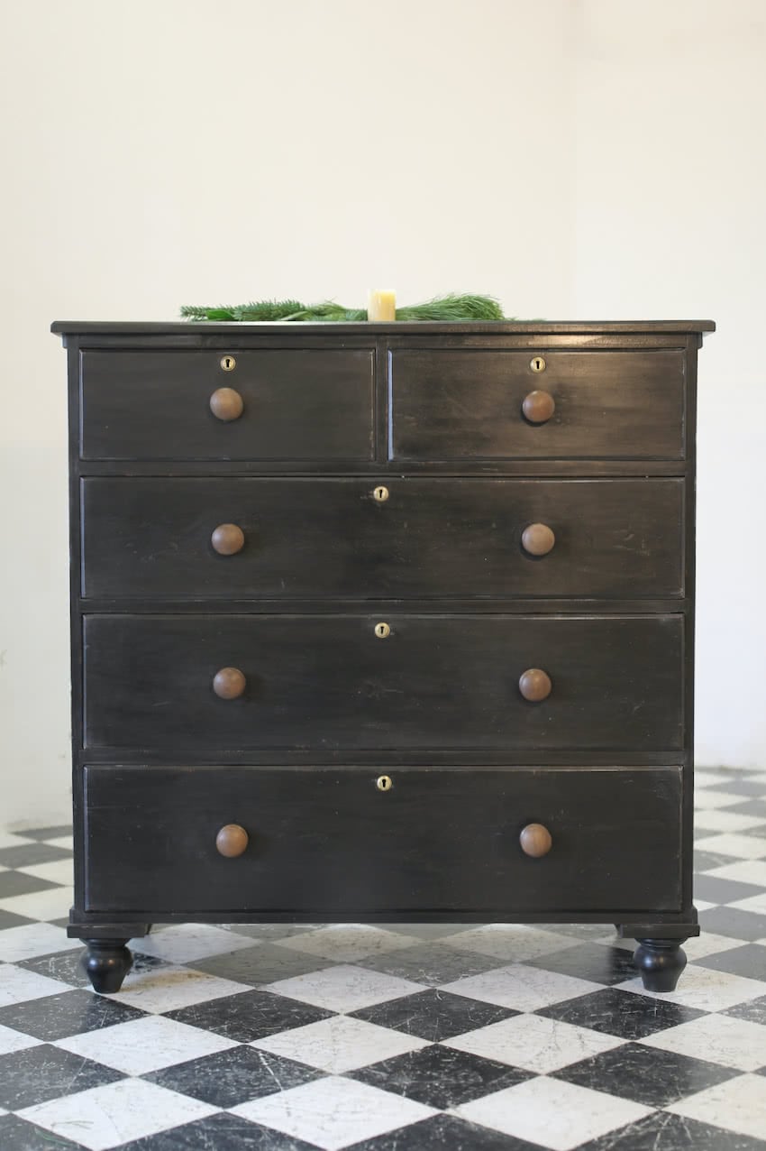 large victorian pine painted black chest with five graduating drawers, contrasting brown knobs & turned feet, very solid and heavy.