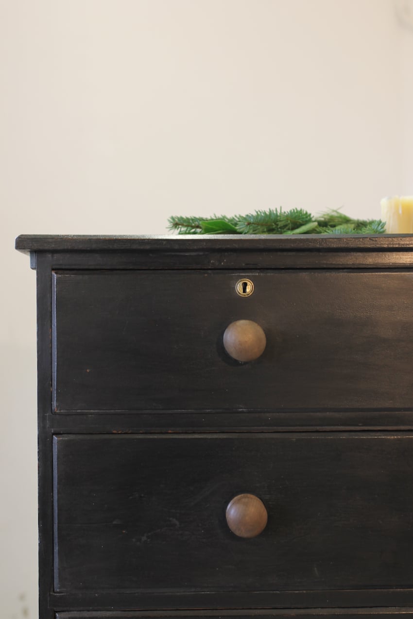 large victorian pine painted black chest with five graduating drawers, contrasting brown knobs & turned feet, very solid and heavy.
