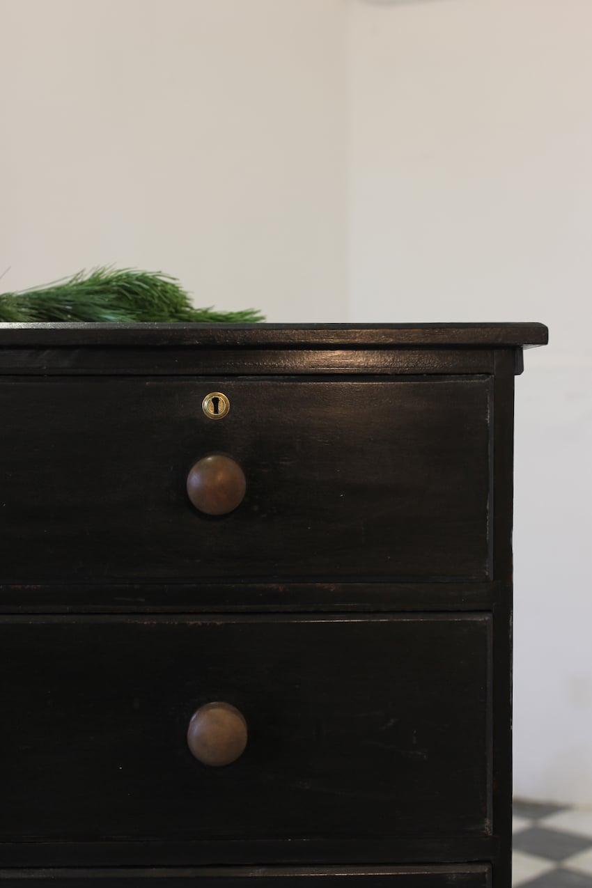 large victorian pine painted black chest with five graduating drawers, contrasting brown knobs & turned feet, very solid and heavy.