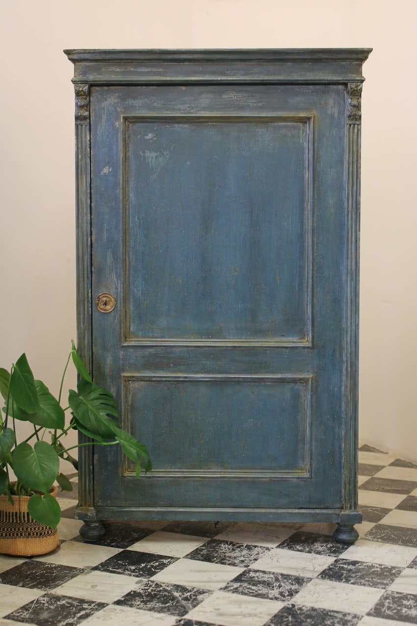 blue tall pine shelved cupboard