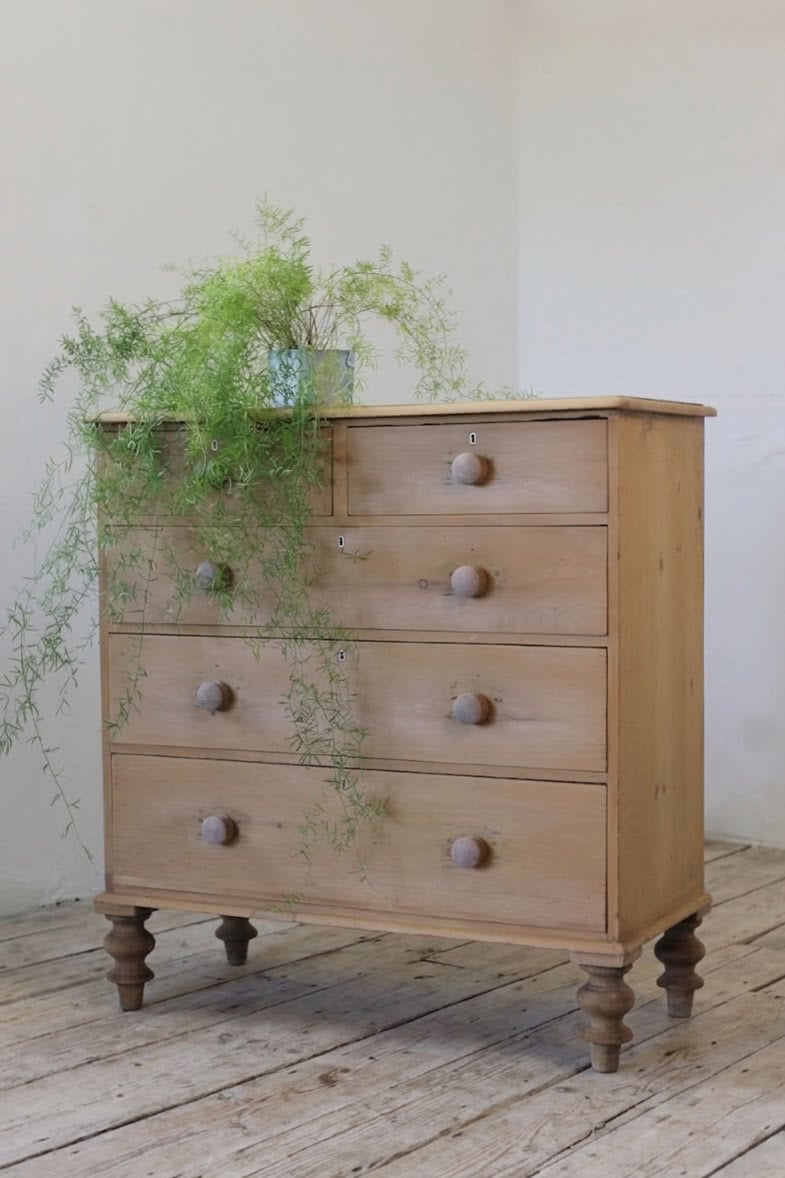 gorgeous looking antique english pine chest with new knobs and original feet, a very solid large chest of drawers.
