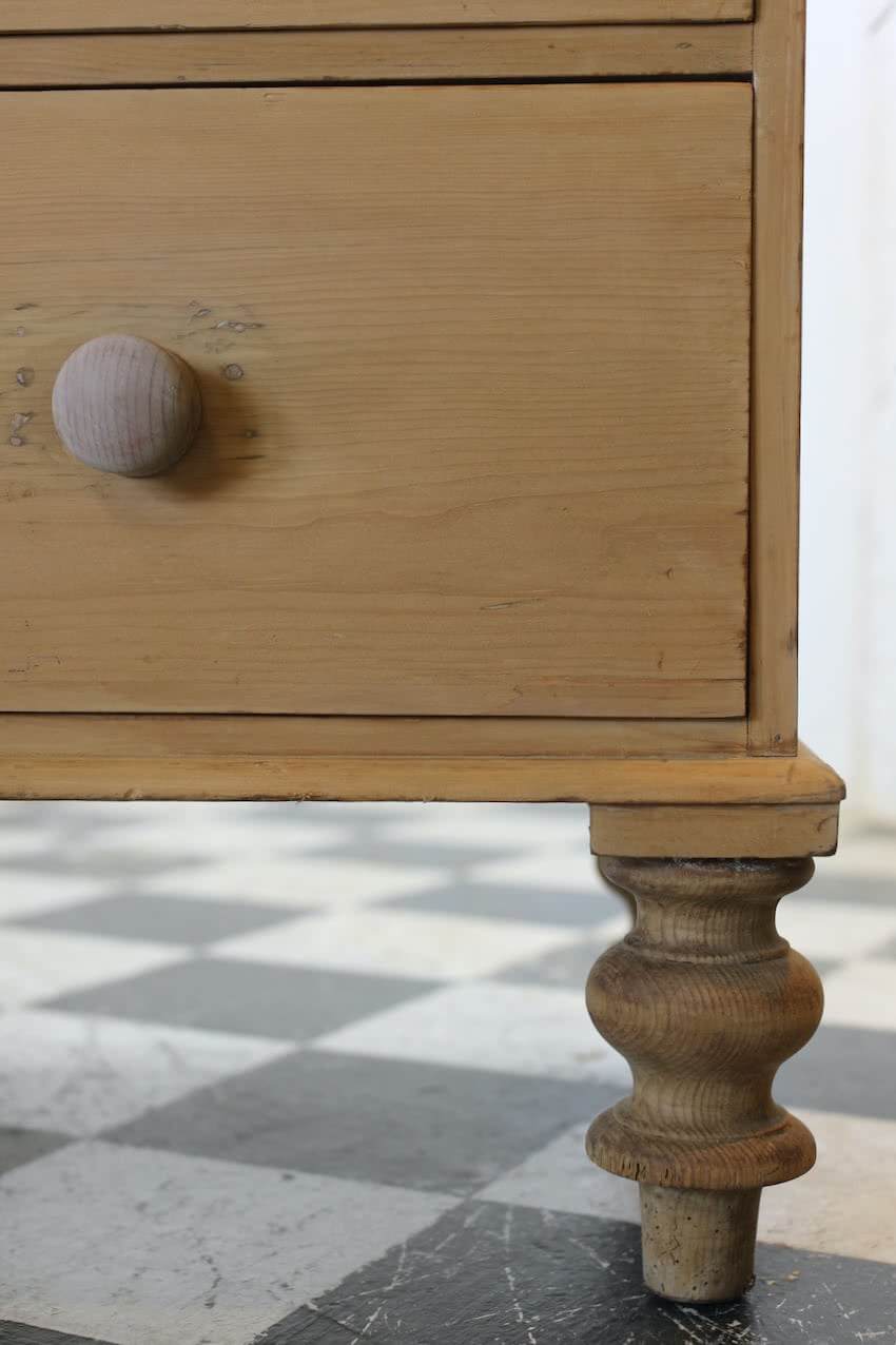 gorgeous looking antique english pine chest with new knobs and original feet, a very solid large chest of drawers.