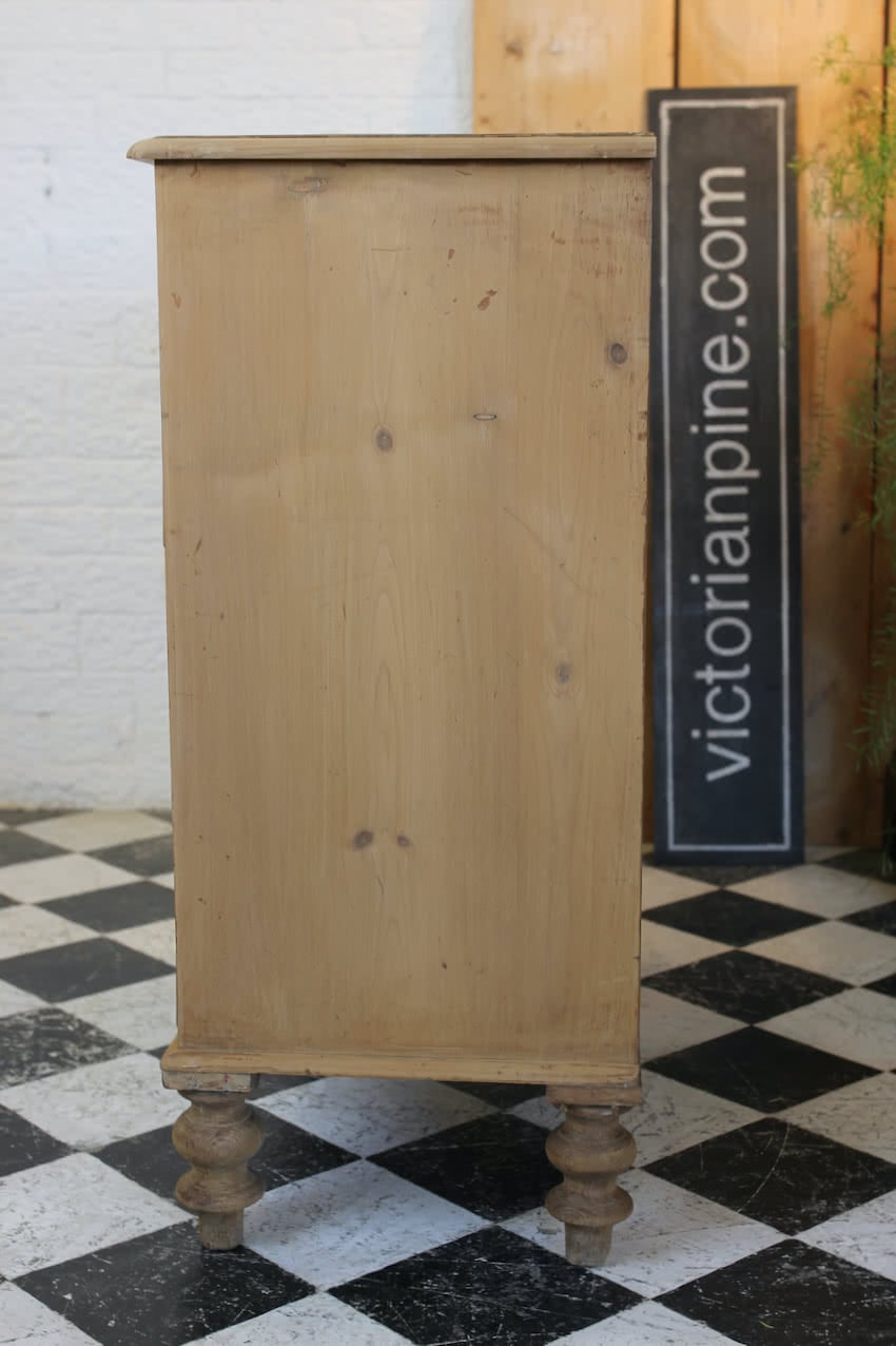 gorgeous looking antique english pine chest with new knobs and original feet, a very solid large chest of drawers.