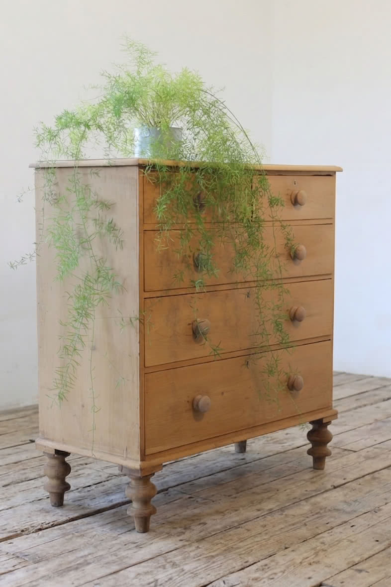 gorgeous looking antique english pine chest with new knobs and original feet, a very solid large chest of drawers.