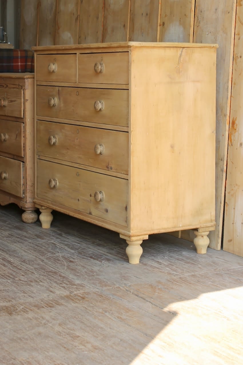 beautiful fine pine large victorian chest with five graduating drawers, very clean condition with wooden knobs & new turned feet.