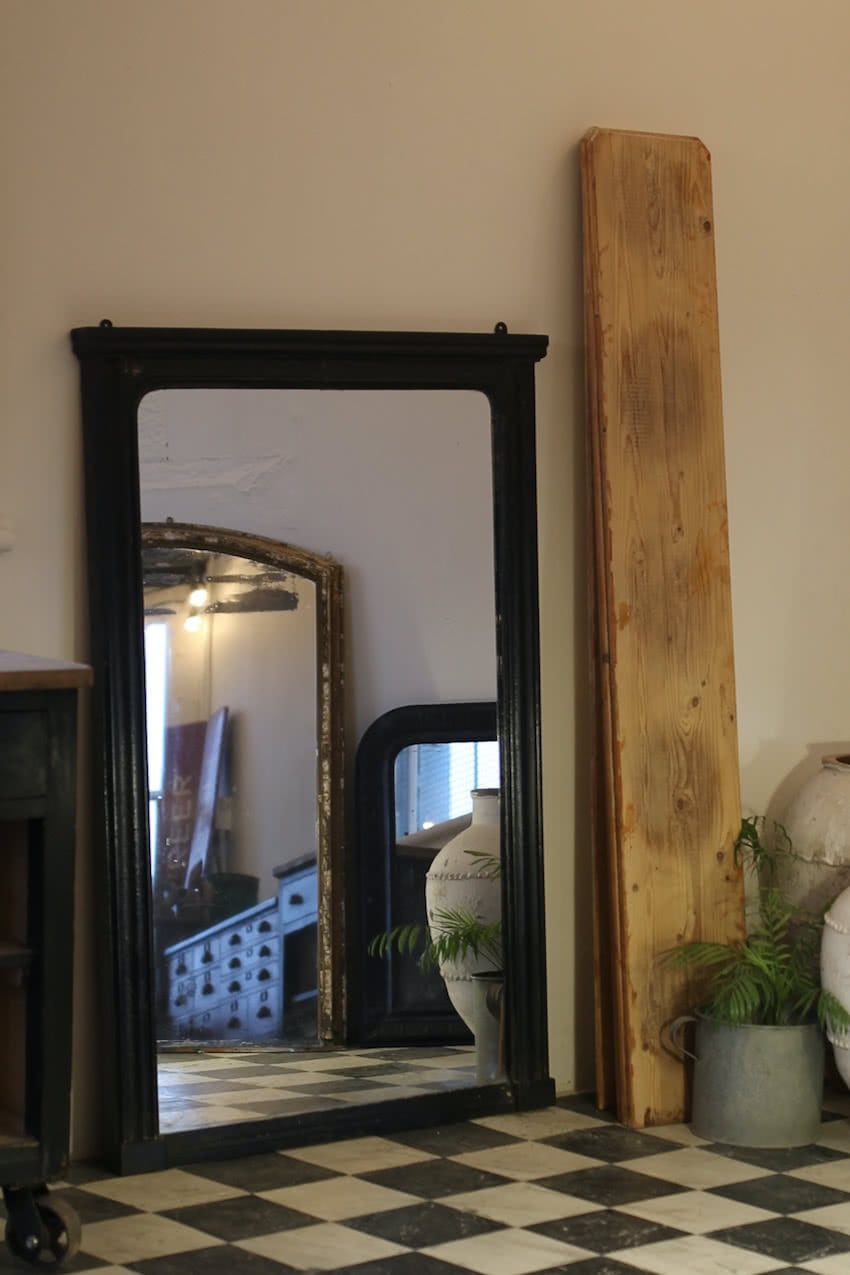 gorgeous antique large old mirror, fairly heavy with original clean glass and without any foxing refinished in black with a coat of wax