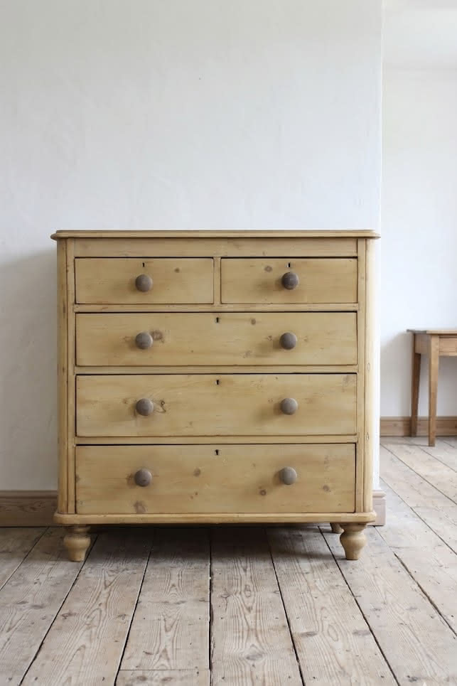 beautiful antique pine chest with five graduating drawers, wooden knobs and original feet, lovely shaped detailing too & fully restored.