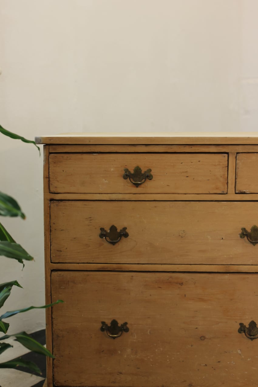 beautiful old pine large dresser base from bath, seven graduating drawers with very deep drawers at the bottom, old brass handles & in the natural finish.
