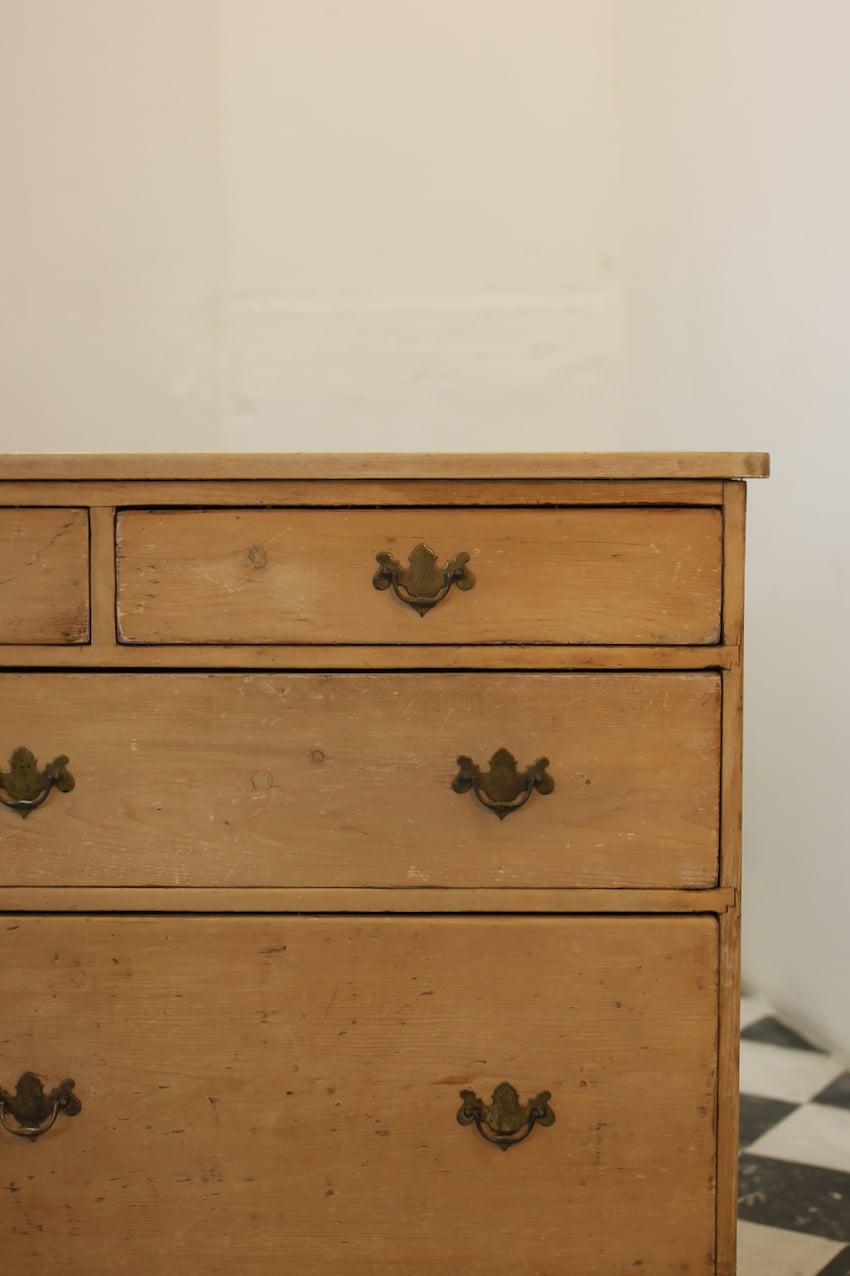 beautiful old pine large dresser base from bath, seven graduating drawers with very deep drawers at the bottom, old brass handles & in the natural finish.