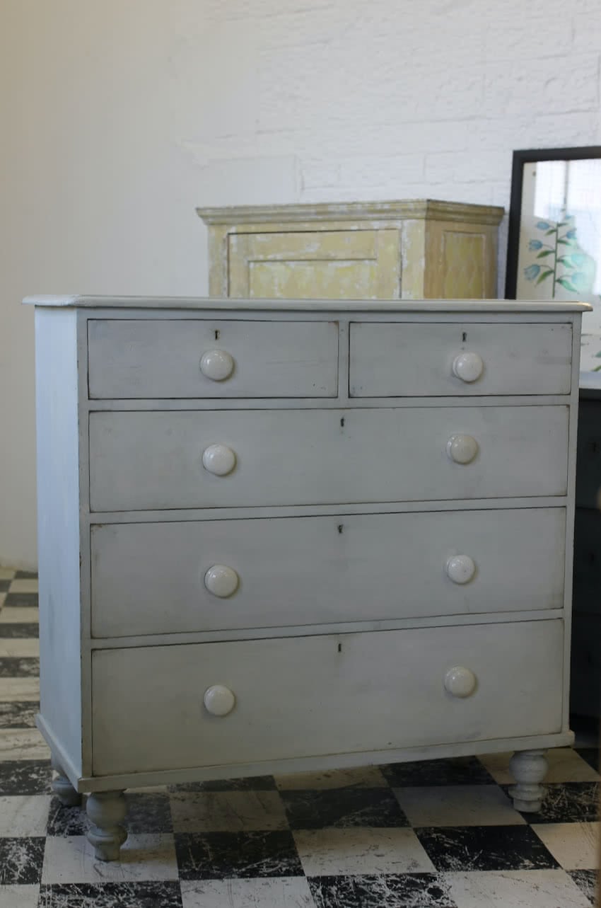 classic victorian pine chest of drawers restored and refinished with original ceramic knobs & pretty turned tall feet.