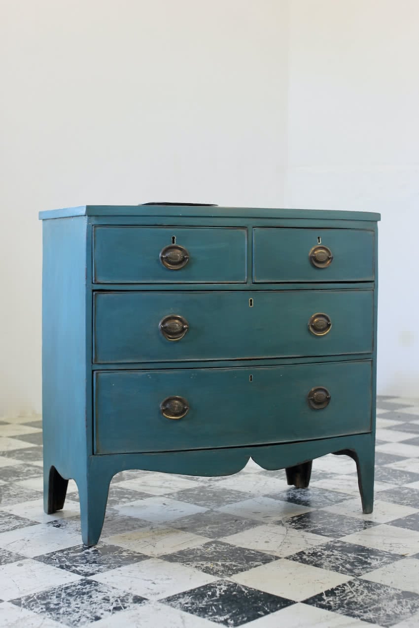 very pretty early victorian, possibly georgian pine chest with brass handles, lovely shaped bracket tall feet refinished in teal and light grey.