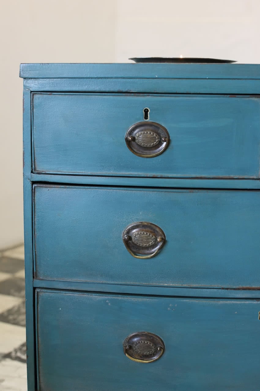 restored english very cute period chest refinished in teal with original brass handles & gorgeous shaping.