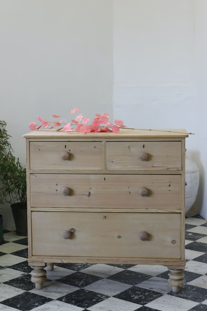 very pretty stripped and restored pine victorian pine chest with original knobs, lovely turned feet & beautiful backboards.