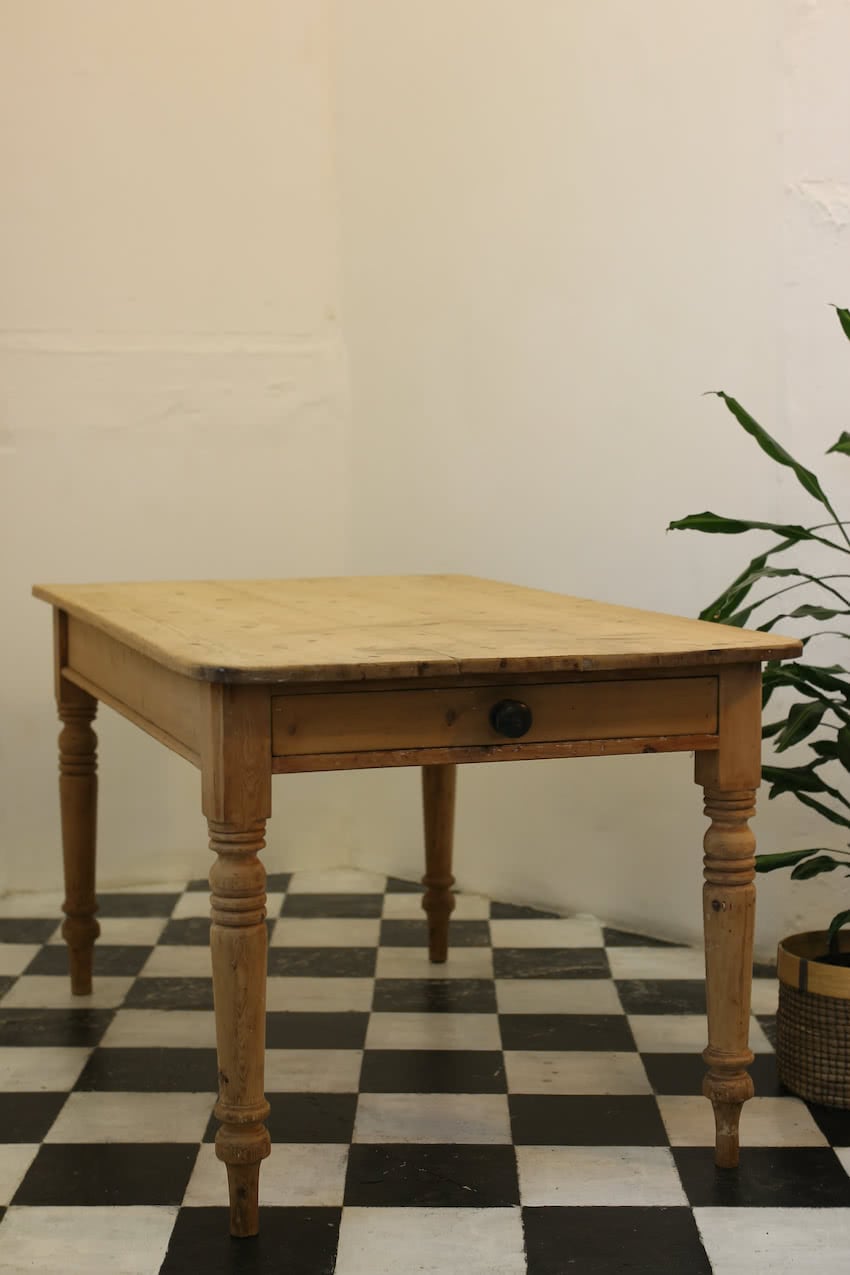 really nice english pine table with one drawer, beautiful shaped turned legs & restored with the natural finish.