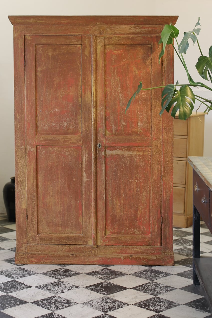 fabulous original red painted pine english cupboard with three shelves.