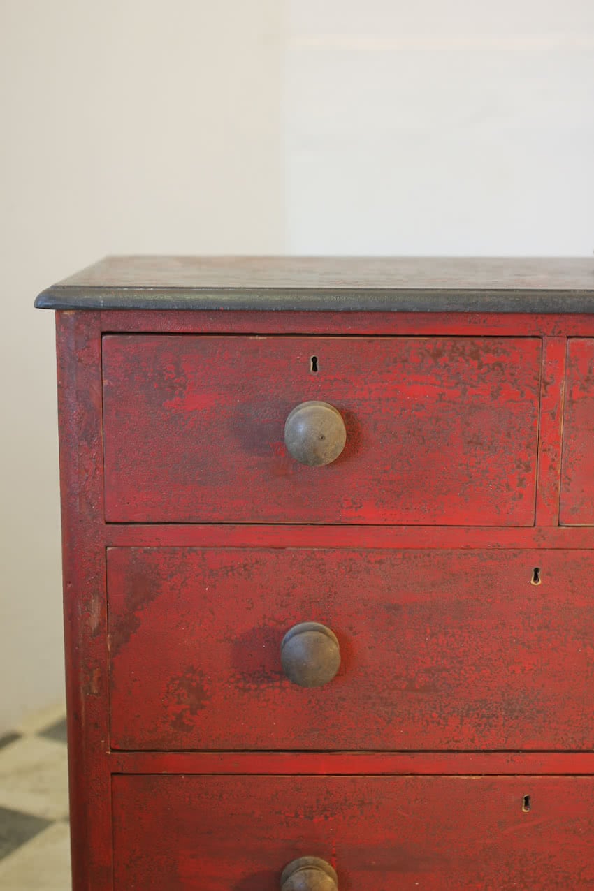 victorian antique pine restored chest with original red paint, turned wooden knobs & the chest sits on repainted black plinth.