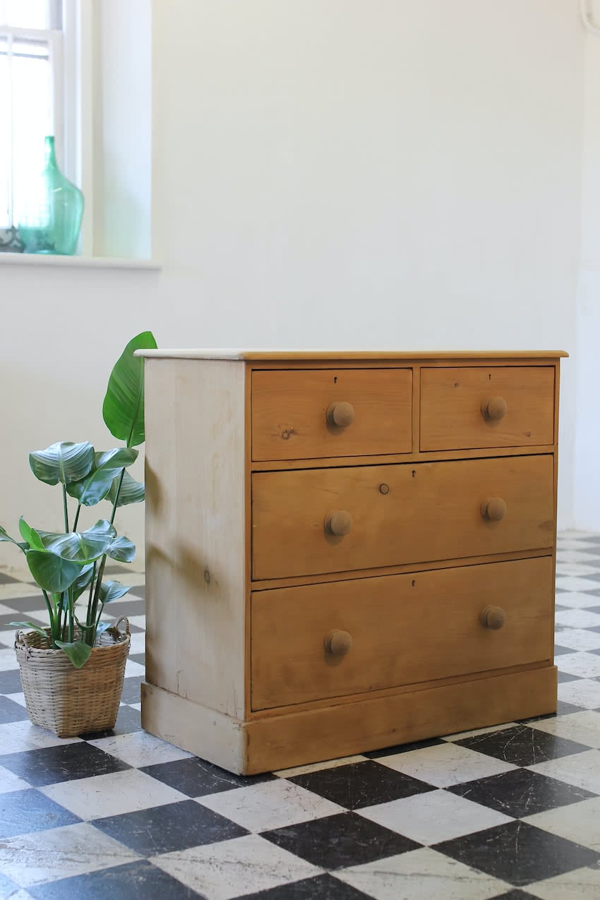 lovely clean looking restored victorian pine chest with fairly large drawers, six wooden knobs & deep plinth.