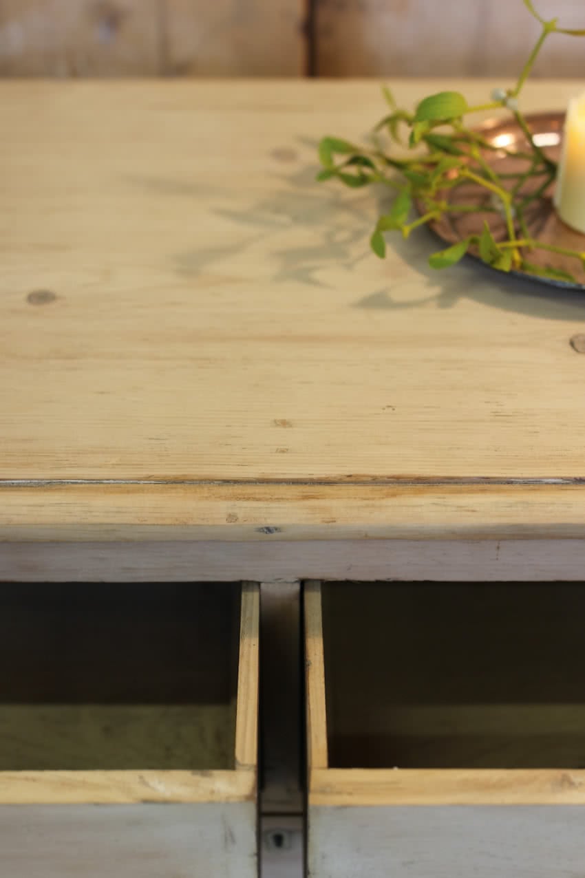 victorian restored rustic looking pine chest with four graduating drawers, wooden knobs and a deep plinth.