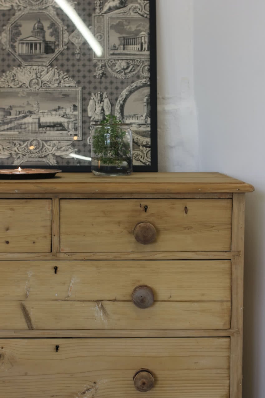 fairly rustic looking stripped pine chest victorian chest with original turned knob and feet & left with a dry finish.