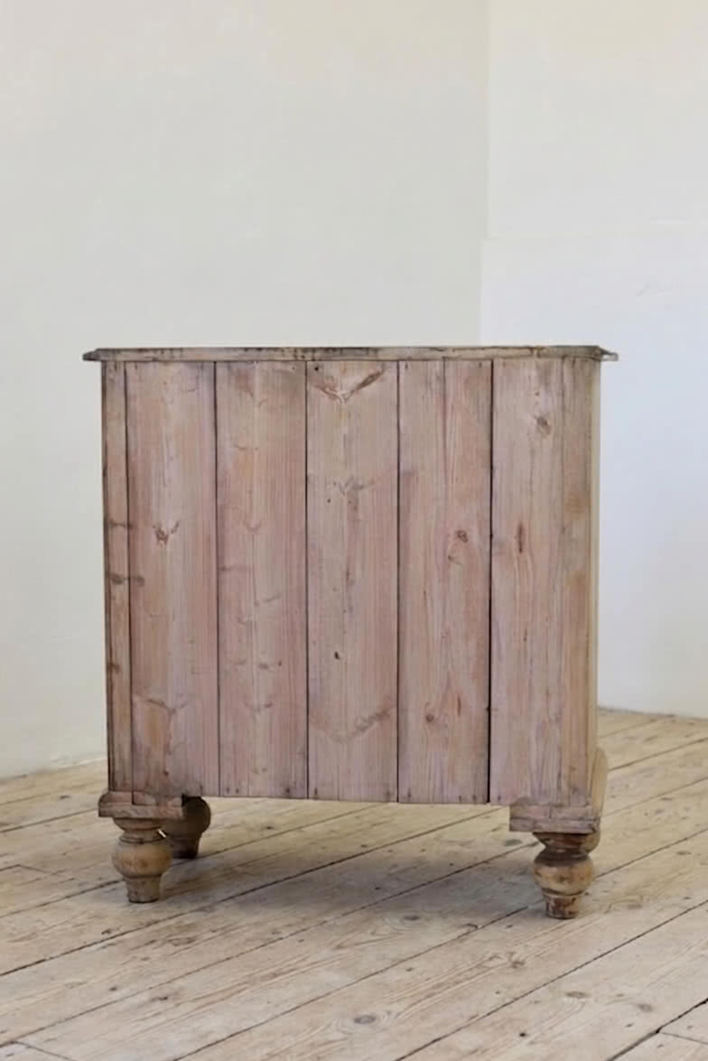 restored fine pine blonde victorian large chest of drawers with original wooden knobs and new turned tulip shaped feet.antique pine chest restored with original knobs and feet, brass keyplates added later.