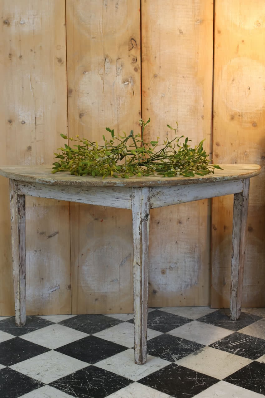 beautiful swedish pair of demi lune tables in original paint in the original condition with painted marbling effect on the top, and a repair done to a leg.