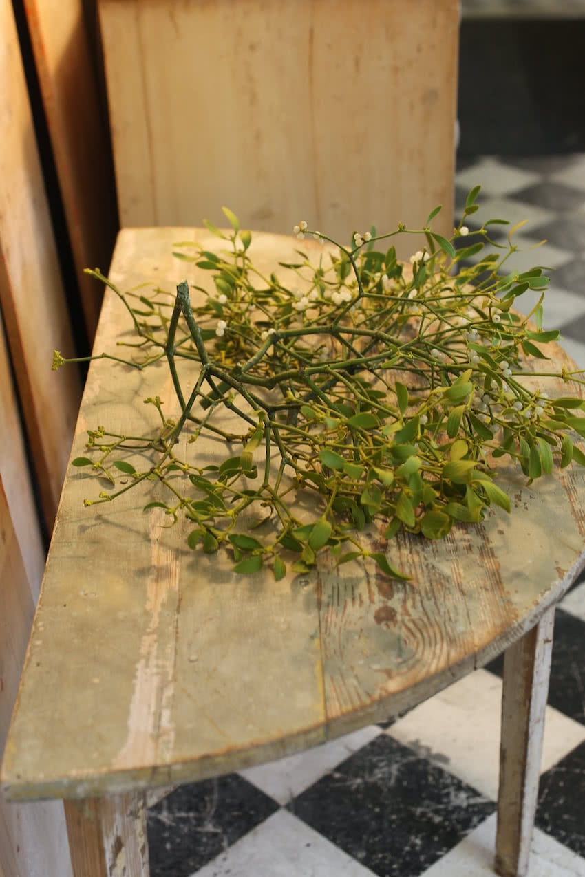 beautiful swedish pair of demi lune tables in original paint in the original condition with painted marbling effect on the top, and a repair done to a leg.