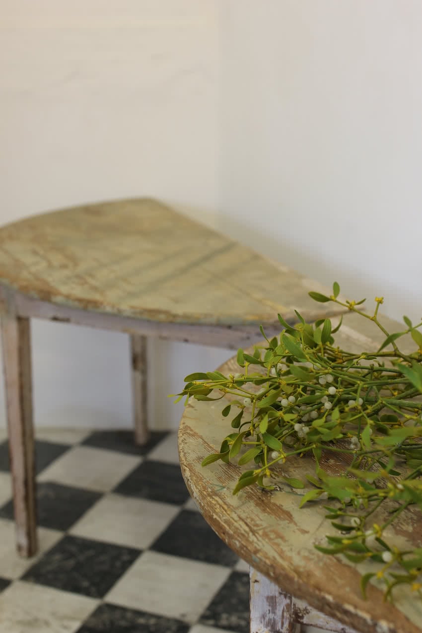 beautiful swedish pair of demi lune tables in original paint in the original condition with painted marbling effect on the top, and a repair done to a leg.