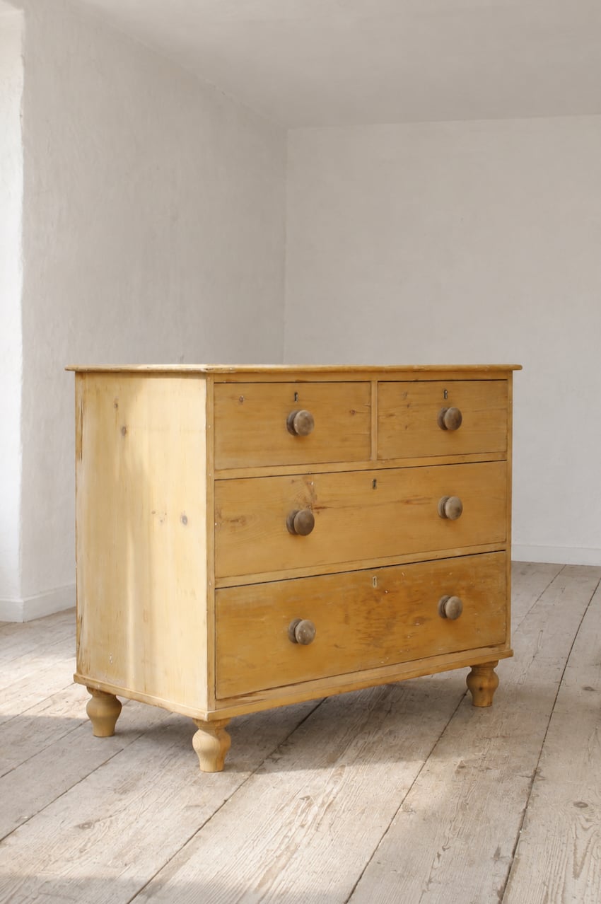 classically shaped solid pine victorian large chest with deep drawers, wooden turned knobs & new feet added..