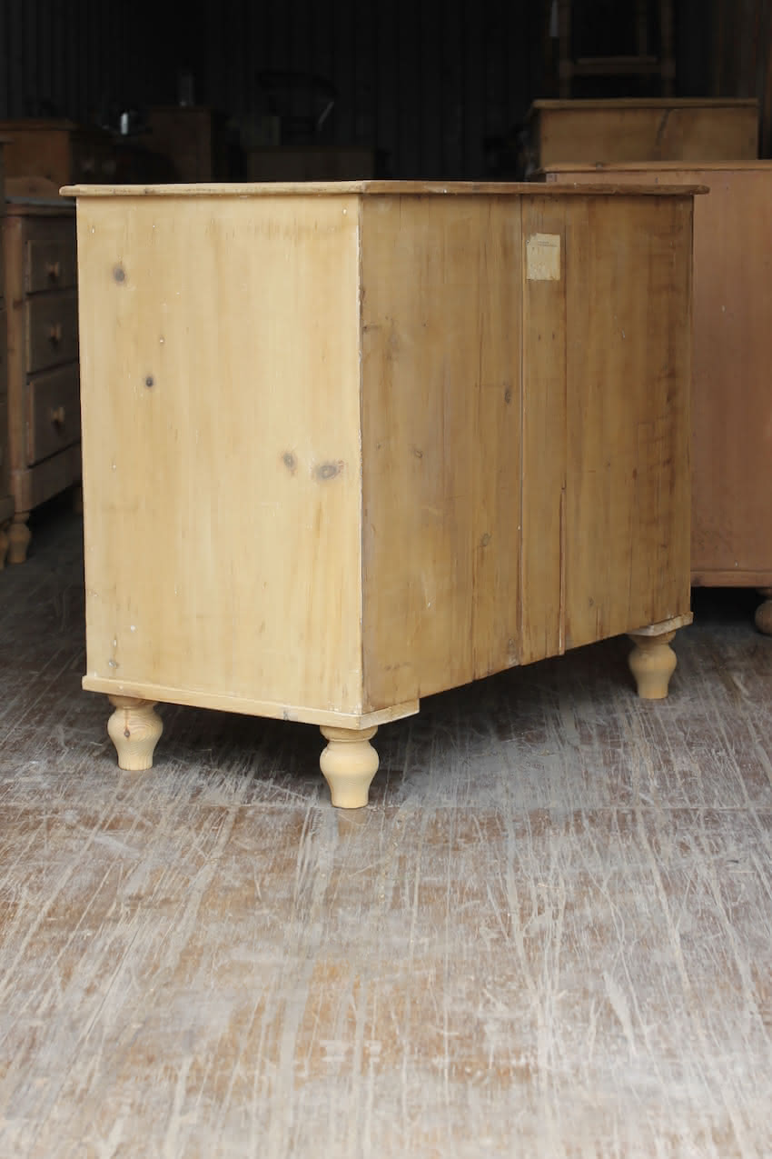 classically shaped solid pine victorian large chest with deep drawers, wooden turned knobs & new feet added..