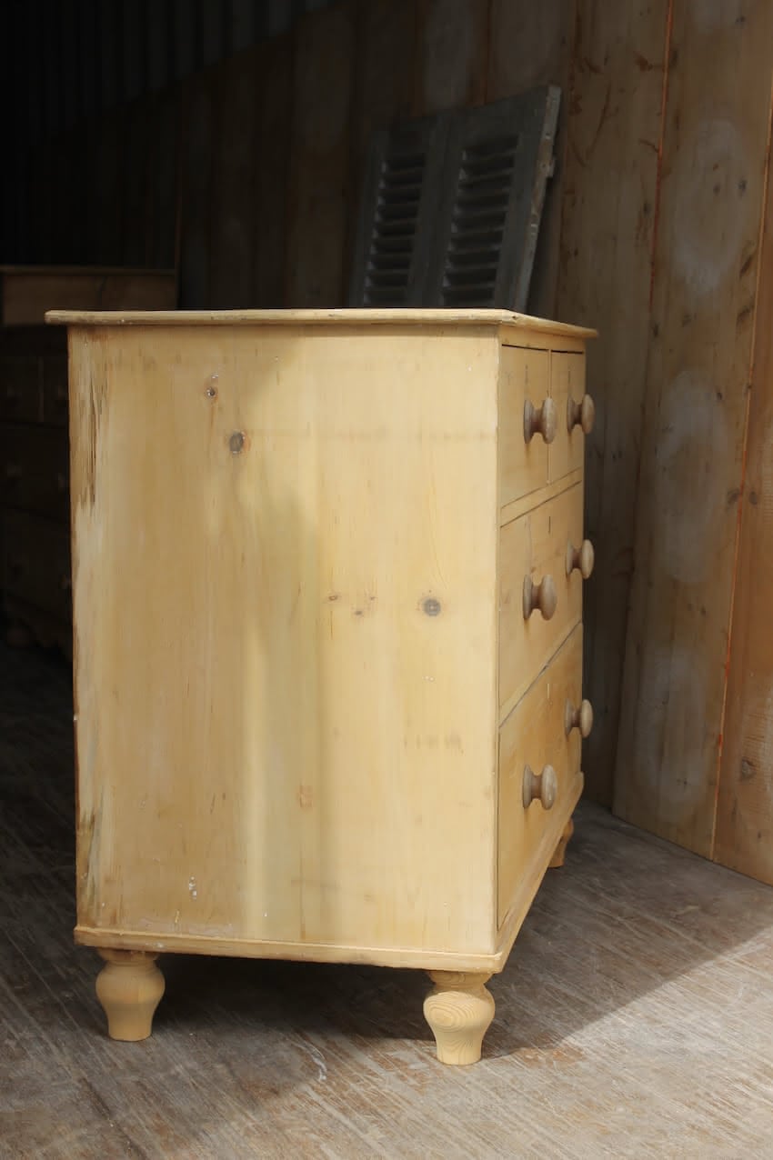 classically shaped solid pine victorian large chest with deep drawers, wooden turned knobs & new feet added..