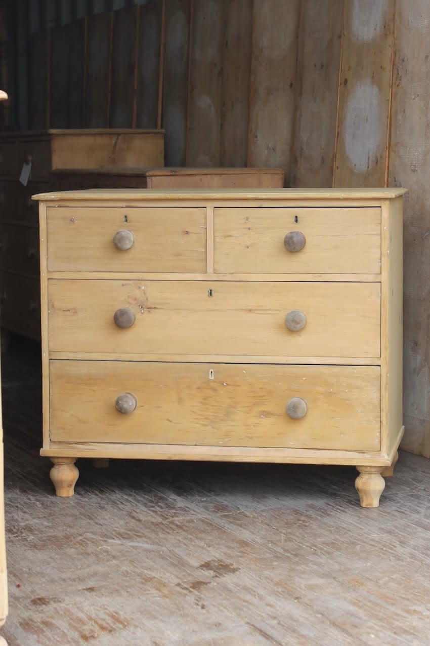 classically shaped solid pine victorian large chest with deep drawers, wooden turned knobs & new feet added..